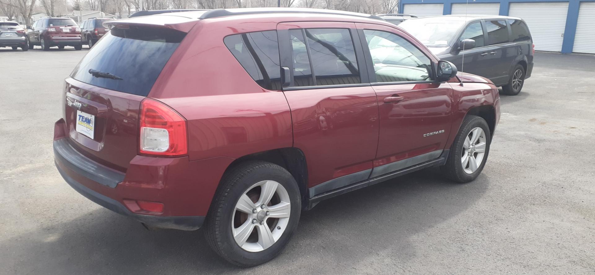 2011 Jeep Compass Sport FWD (1J4NT1FB0BD) with an 2.4L L4 DOHC 16V engine, 5-Speed Manual transmission, located at 2015 Cambell Street, Rapid City, SD, 57701, (605) 342-8326, 44.066433, -103.191772 - CARFAX AVAILABLE - Photo#3